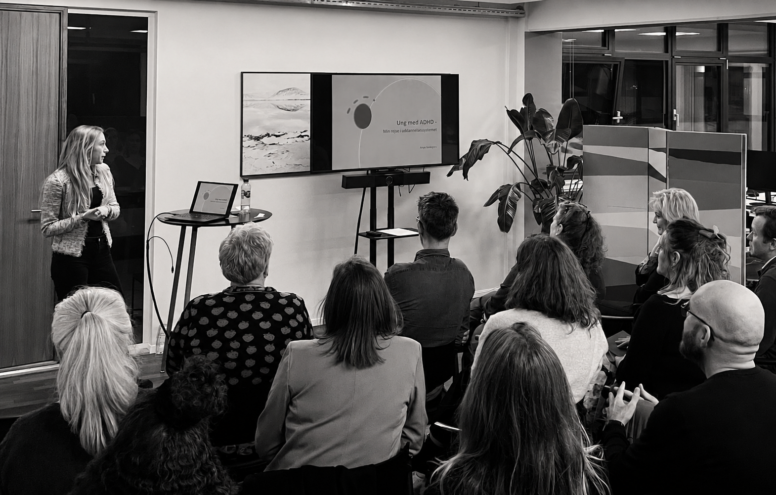Anya Swiegers giving a talk to an audience
